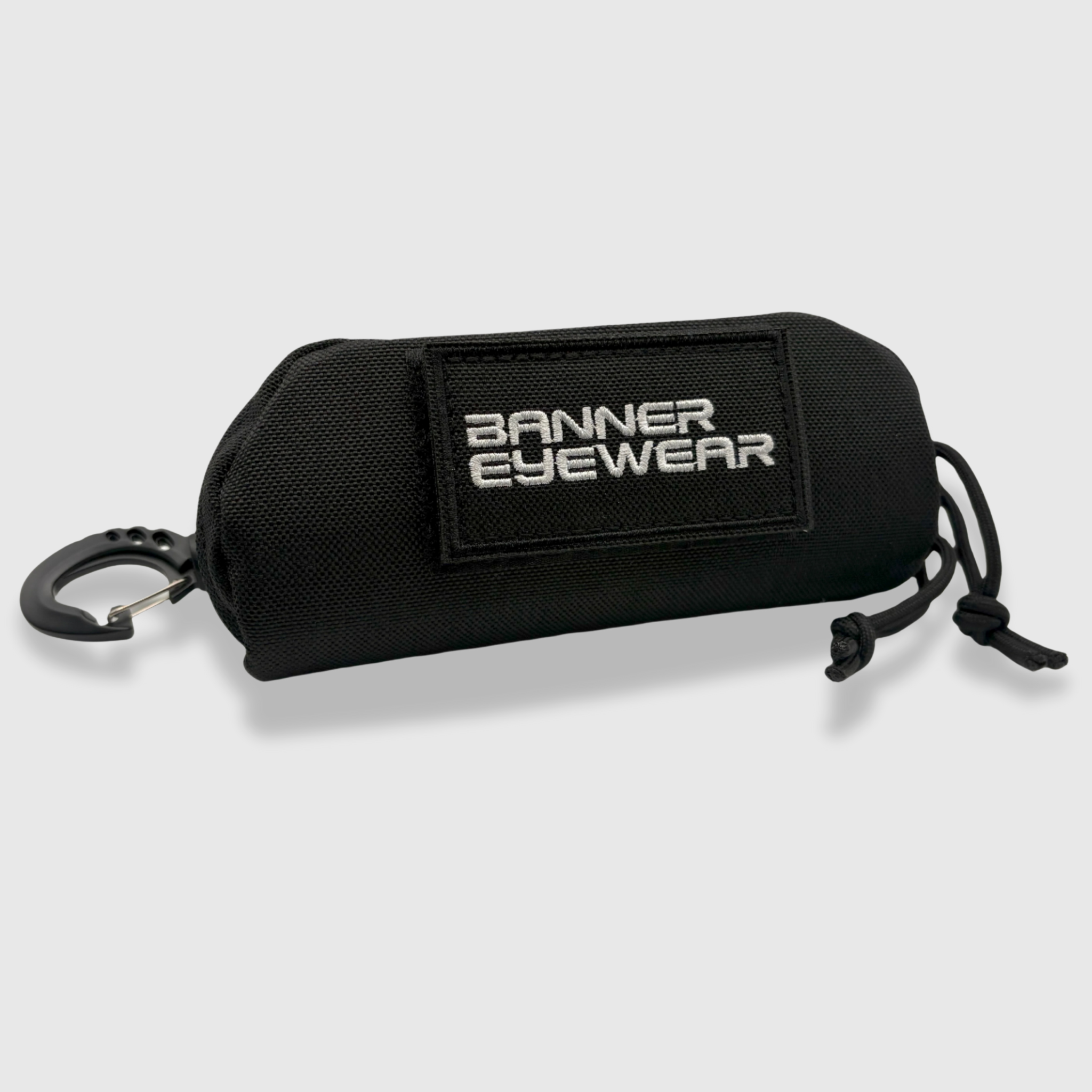 Armadillo black glasses case with banner eyewear patch and molle attachment