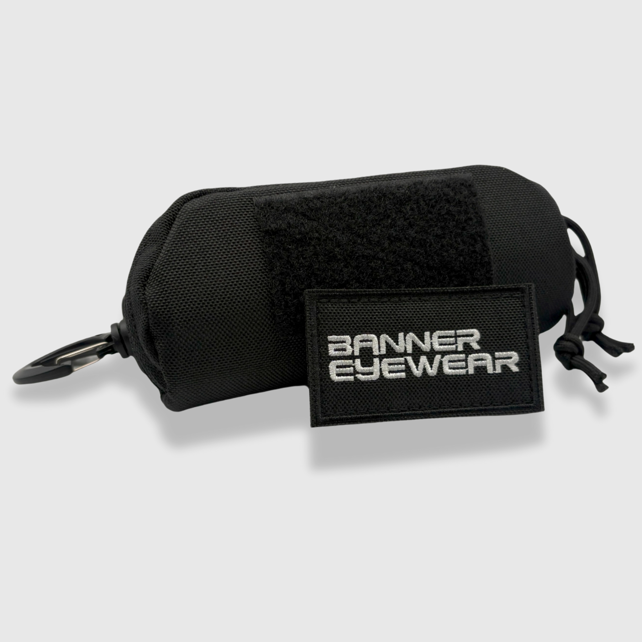 Armadillo black glasses case with banner eyewear patch and molle attachment