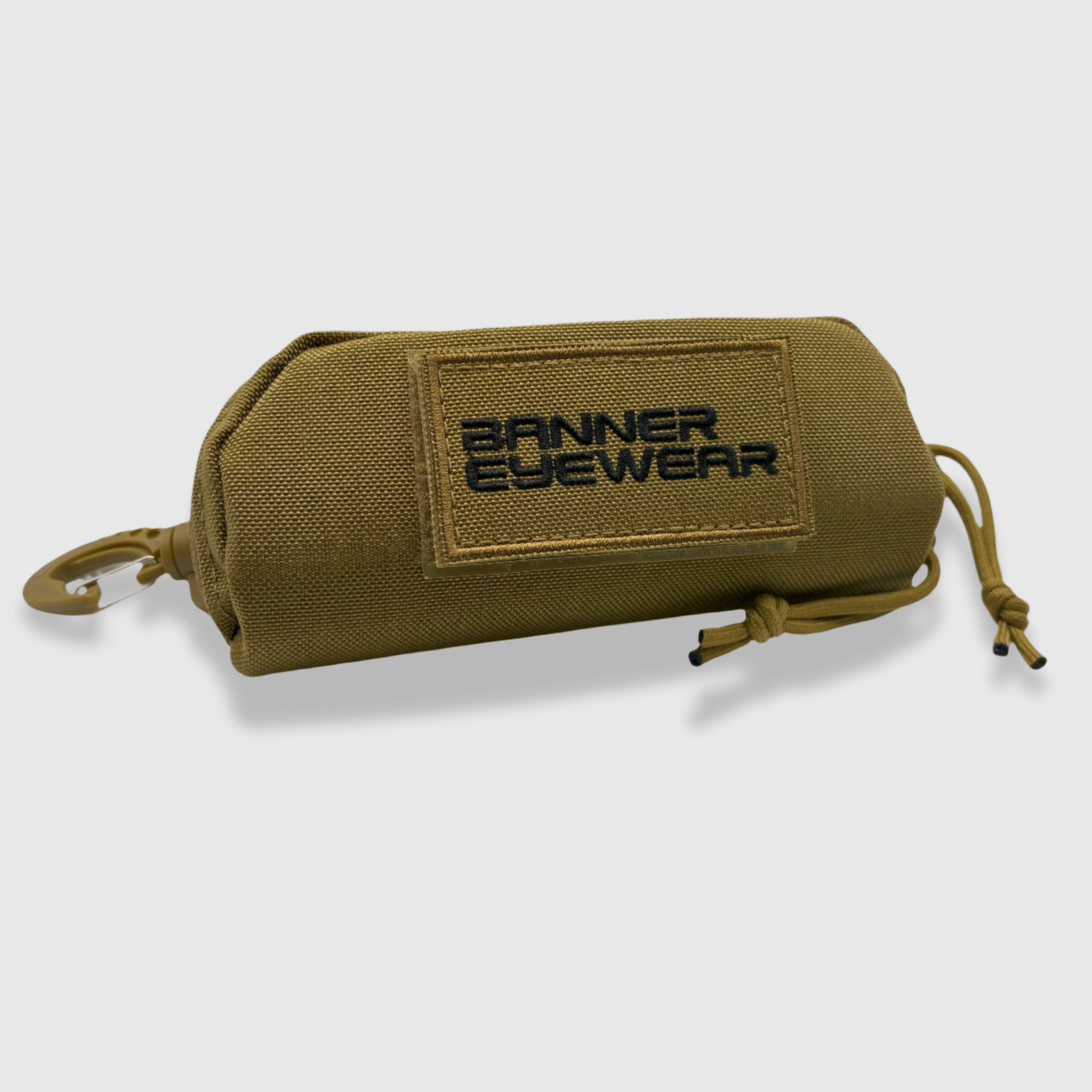 Armadillo tan glasses case with banner eyewear patch and molle attachment