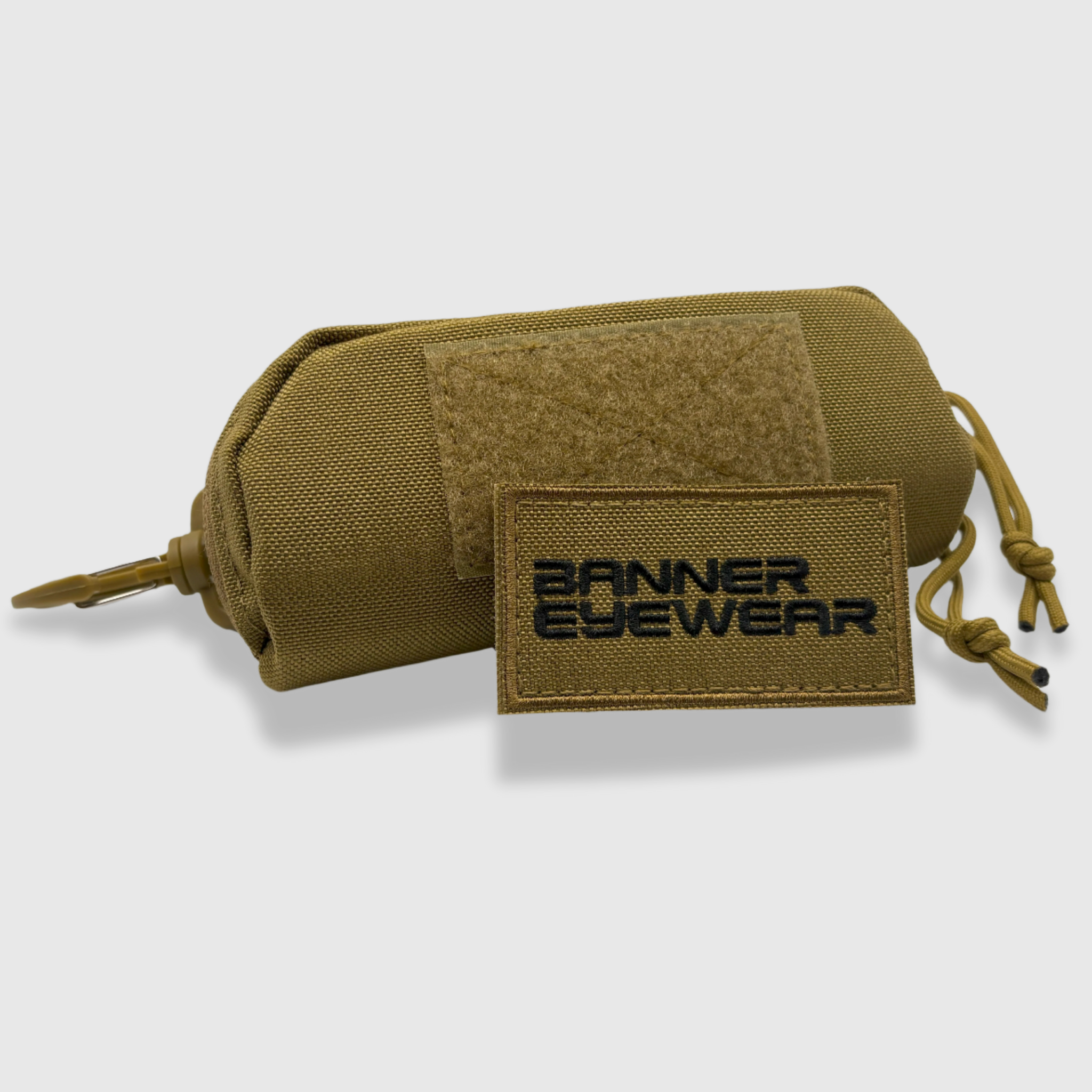 Armadillo tan glasses case with banner eyewear patch and molle attachment