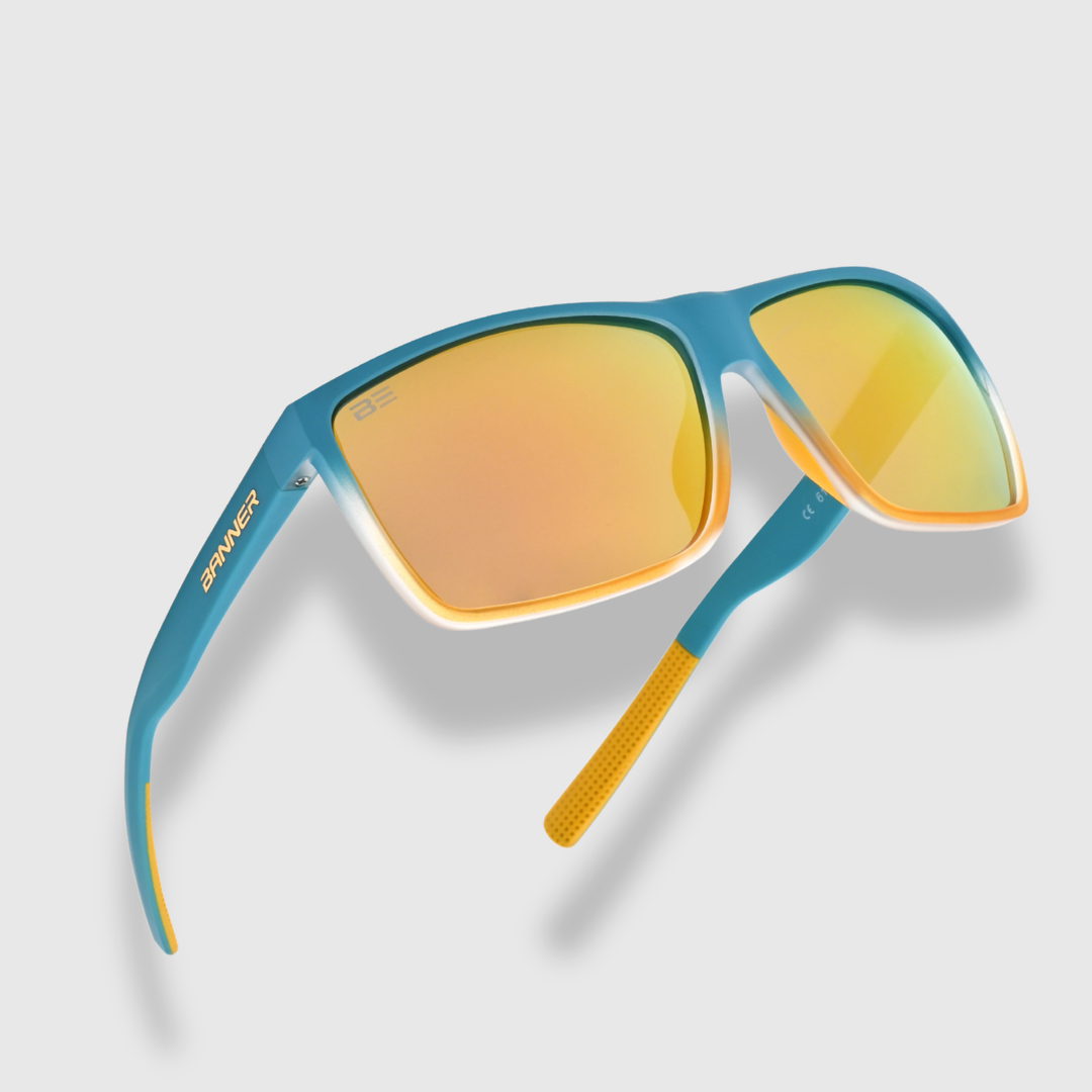 RANGERS BRONZE sunglasses with a orange bronze gradient lens on a light gray background