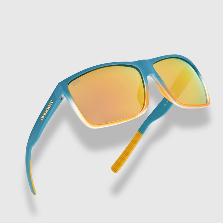 RANGERS BRONZE sunglasses with a orange bronze gradient lens on a light gray background