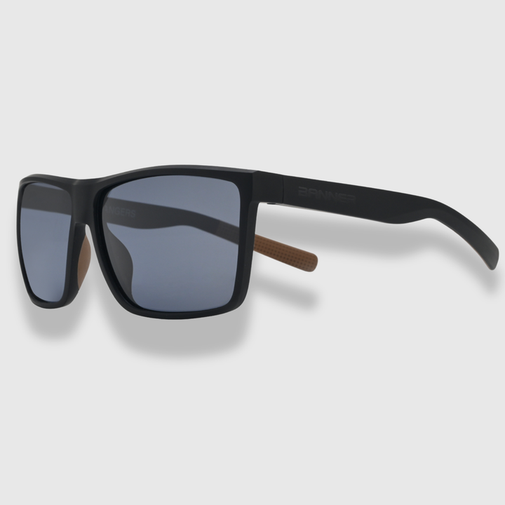 RANGERS ONYX sunglasses with a gray gradient lens on a light gray background