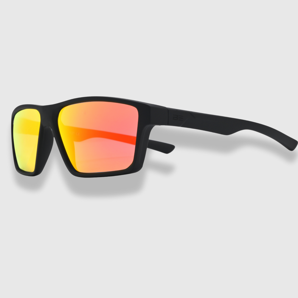VALOR CRIMSON sunglasses with a red orange gradient lens on a light gray background