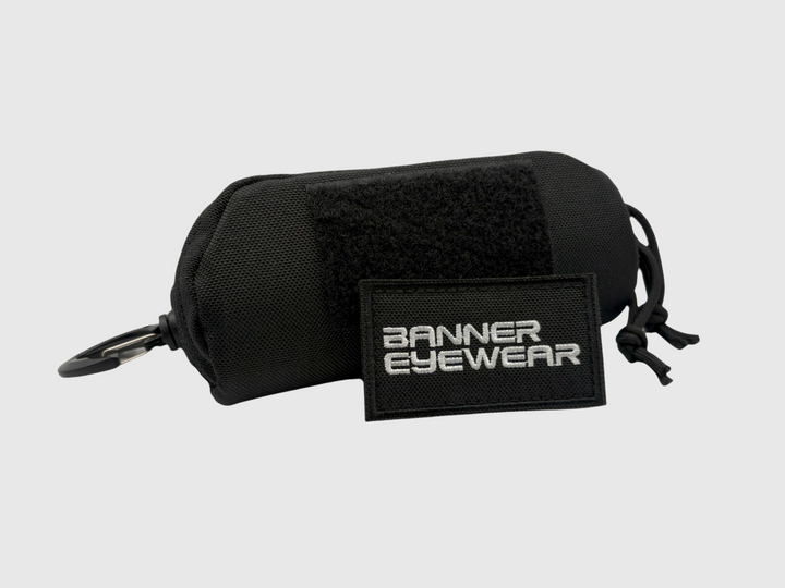 Armadillo black glasses case with banner eyewear patch and molle attachment
