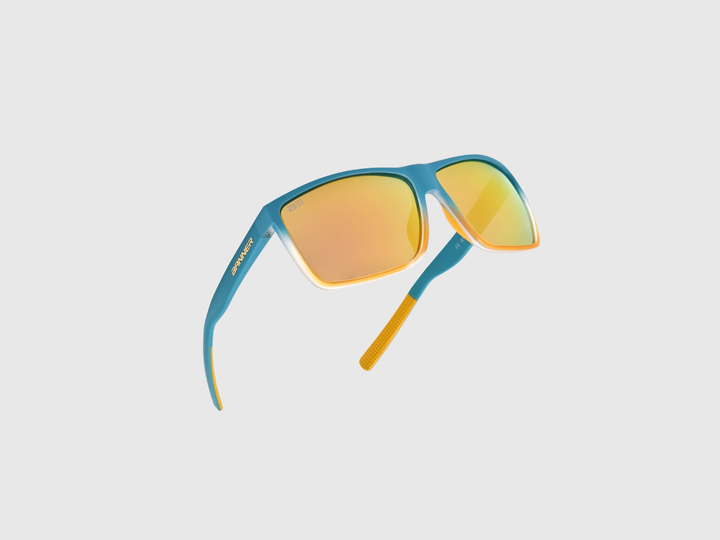 RANGERS BRONZE sunglasses with a orange bronze gradient lens on a light gray background