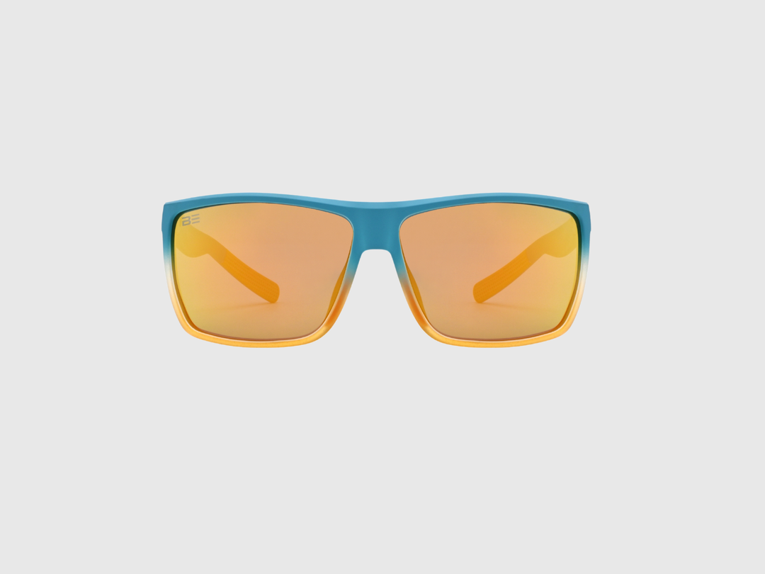RANGERS BRONZE sunglasses with a orange bronze gradient lens on a light gray background