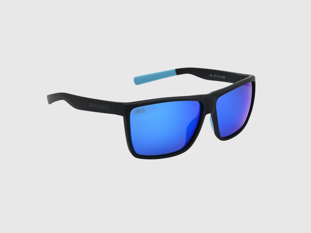 RANGERS COBALT sunglasses with a blue gradient lens on a light gray background