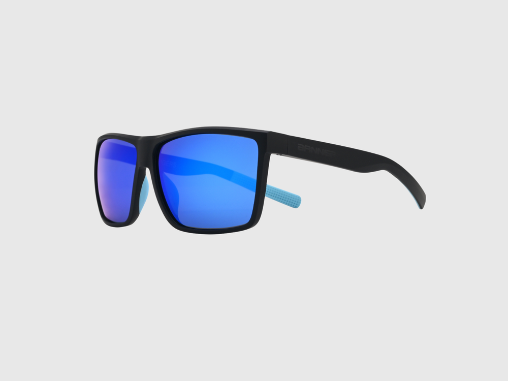 RANGERS COBALT sunglasses with a blue gradient lens on a light gray background