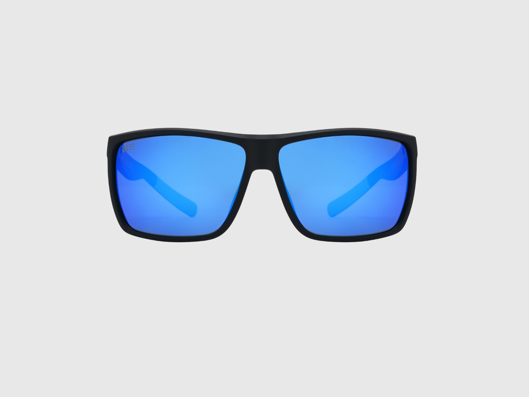 RANGERS COBALT sunglasses with a blue gradient lens on a light gray background