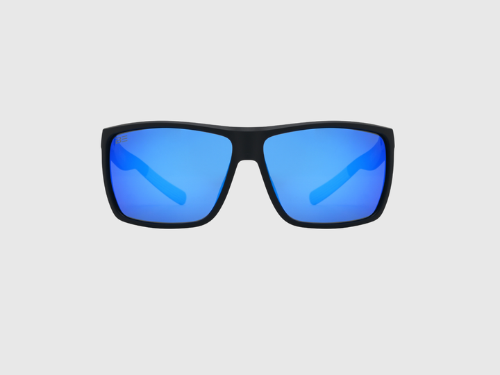 RANGERS COBALT sunglasses with a blue gradient lens on a light gray background