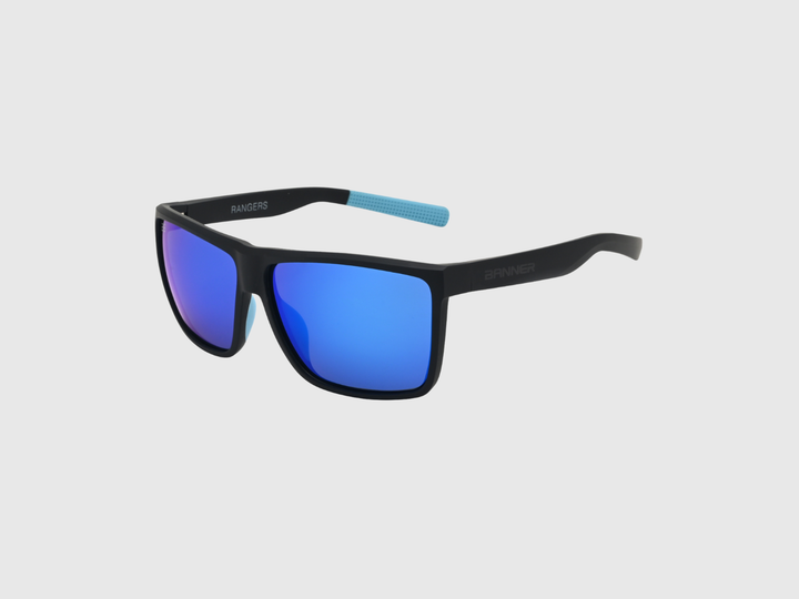 RANGERS COBALT sunglasses with a blue gradient lens on a light gray background