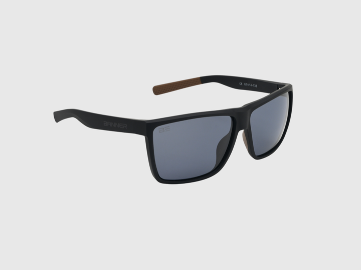 RANGERS ONYX sunglasses with a gray gradient lens on a light gray background