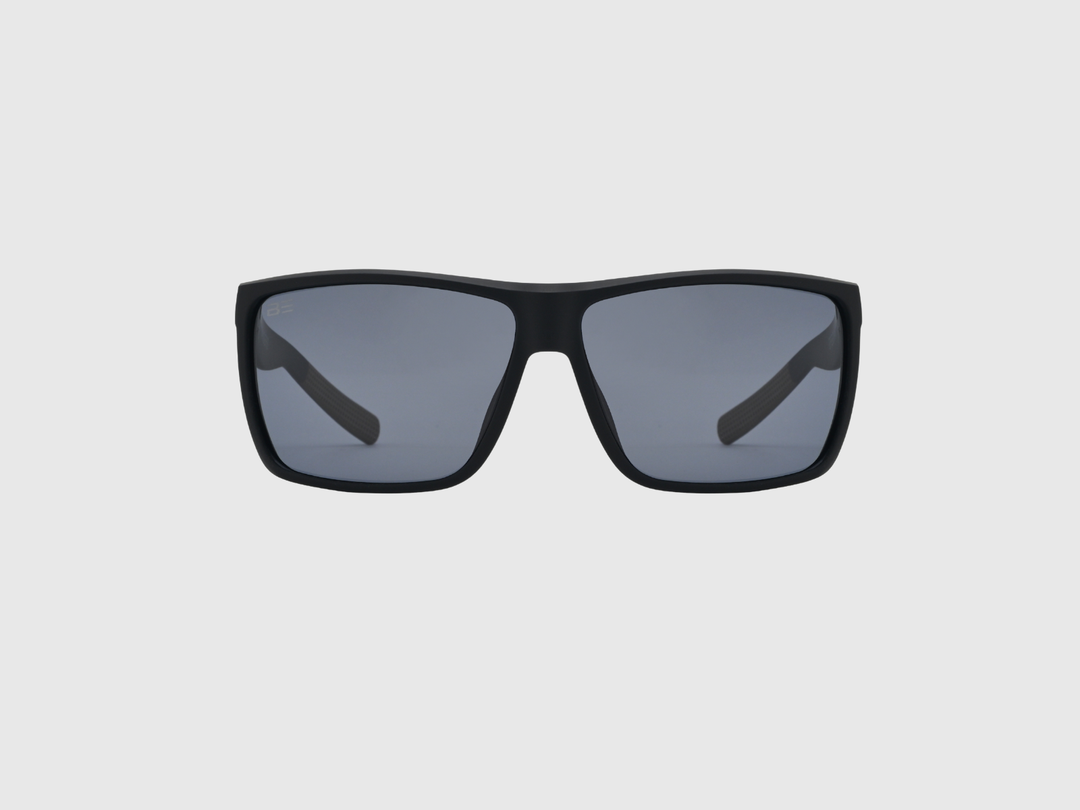 RANGERS ONYX sunglasses with a gray gradient lens on a light gray background