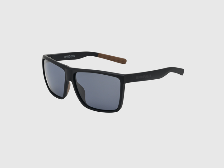 RANGERS ONYX sunglasses with a gray gradient lens on a light gray background