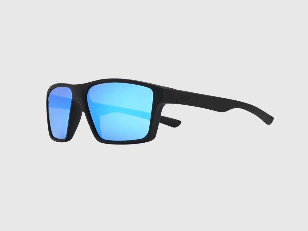 VALOR ARCTIC sunglasses with a blue gradient lens on a light gray background