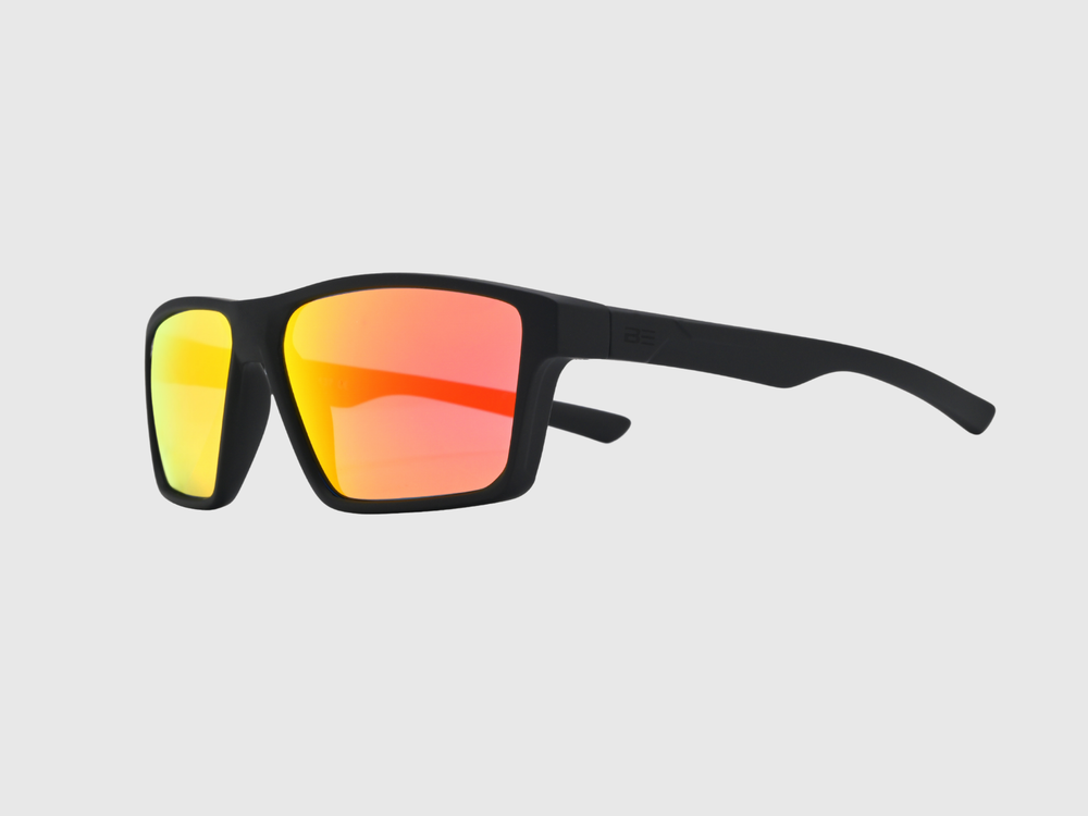 VALOR CRIMSON sunglasses with a red orange gradient lens on a light gray background
