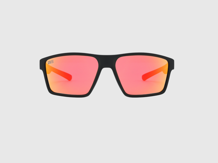 VALOR CRIMSON sunglasses with a red orange gradient lens on a light gray background