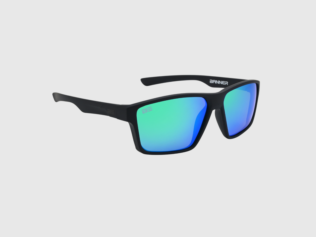 VALOR RECON sunglasses with a green blue gradient lens on a light gray background