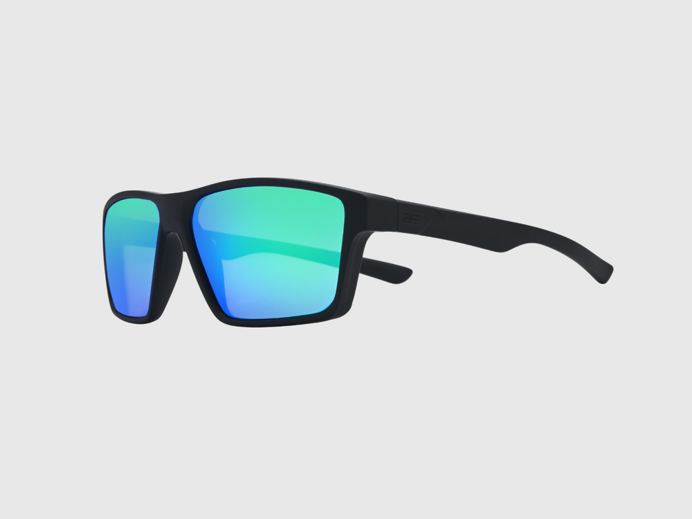 VALOR RECON sunglasses with a green blue gradient lens on a light gray background